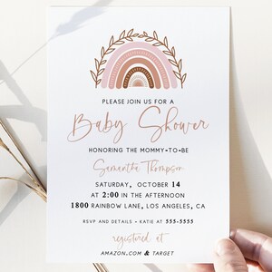 May include: A baby shower invitation with a pink, brown, and white rainbow illustration. The text reads "Please join us for a Baby Shower honoring the mommy-to-be Samantha Thompson Saturday, October 14 at 2:00 in the afternoon 1800 Rainbow Lane, Los Angeles, CA RSVP and details - Katie at 555-5555 registered at AMAZON.COM & TARGET"