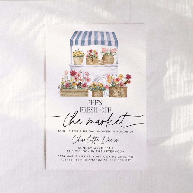 May include: A floral themed bridal shower invitation with a watercolor illustration of a flower cart. The text reads 'She's Fresh Off the Market' and includes the bride's name, date, time, and location. The invitation also includes a request to RSVP to Amanda at (555) 555-1212.
