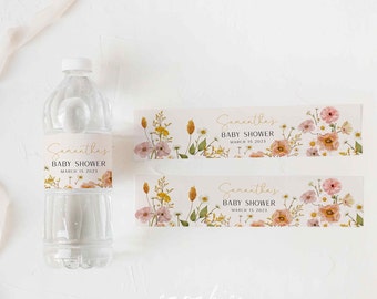 May include: Two printable water bottle labels with a floral design in shades of pink, yellow, and green. The labels feature the text "Samantha's Baby Shower" and the date "March 15, 2023".