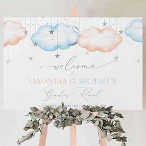 May include: A gender reveal welcome sign with a blue and pink watercolor cloud design and silver stars. The sign reads "Welcome to Samantha & Michael's Gender Reveal September 14, 2020 | Baby on the Way!"