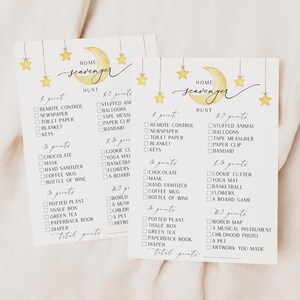 May include: Two printable scavenger hunt lists with a moon and stars theme. The lists include items to find around the house, with points assigned to each item. The lists are titled "Home Scavenger Hunt".
