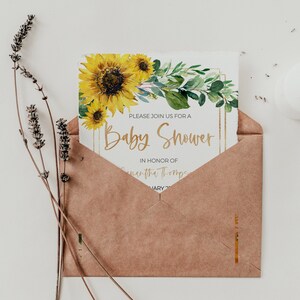 May include: A brown envelope with a white card inside. The card has a watercolor illustration of sunflowers and greenery. The text on the card reads "Please join us for a Baby Shower in honor of Samantha Thompson".