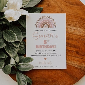May include: A white card with a pink and brown rainbow design. The text on the card reads "Please join us to celebrate Samantha's 5th Birthday! Saturday, October 14 at 2:00 in the afternoon 1800 Rainbow Lane, Los Angeles, CA Kindly reply to Katie at 555-5555 by June 15th".