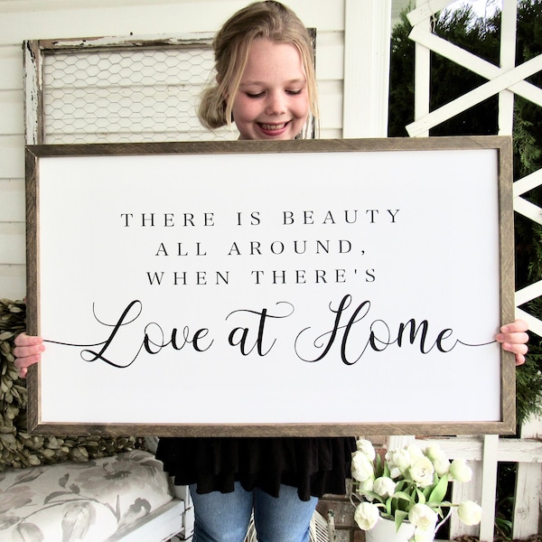There is beauty all around when there's love at Home sign