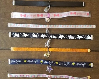 Assorted ribbon collars with charms