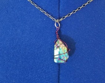 Wire wrapped rainbow hematite on iridescent rainbow chain gemstone pendant