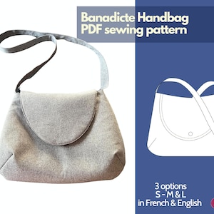 May include: A gray fabric handbag with a flap closure and a long strap. The handbag is shown on a white background. The image also includes a line drawing of the handbag with the text "Banadicte Handbag PDF sewing pattern" and "3 options S-M&L in French & English".