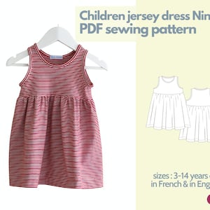 Peut inclure: Patron de couture PDF pour une robe en jersey pour enfants appelée "Nina". Le patron comprend des tailles pour les âges de 3 à 14 ans et est disponible en français et en anglais. L'image montre une robe rayée rouge et blanche sur un cintre et un dessin au trait de la robe.