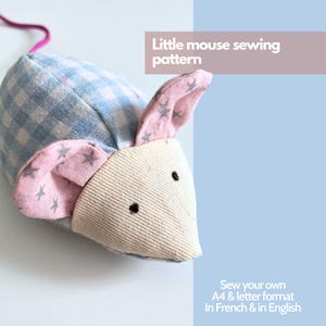May include: A handmade fabric mouse with a light blue and white checkered body, pink ears with gray star patterns, and a beige face. The text "Little mouse sewing pattern" is visible. The image also includes the text "Sew your own A4 & letter format In French & in English."