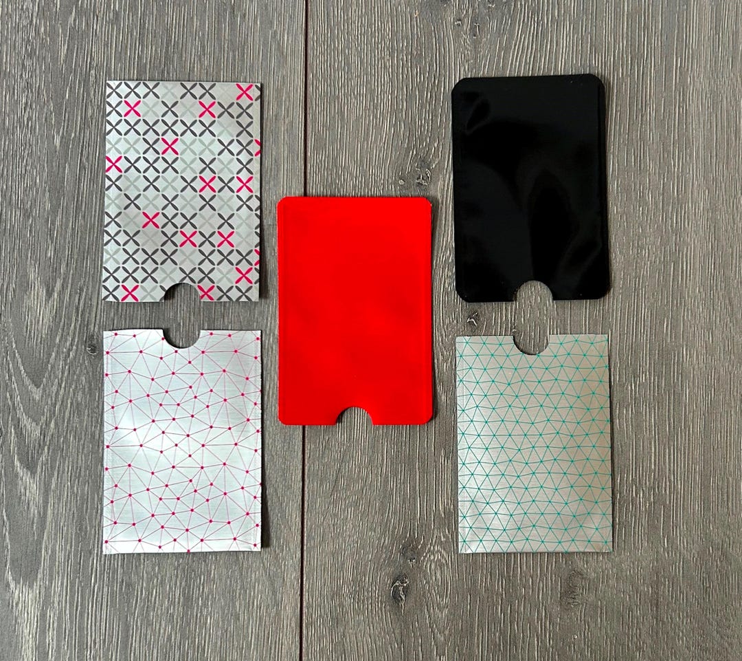 credit card protector sleeve uk RFIDsleeve RFID-Blocking (2 Pack) | Pacsafe® – Pacsafe pack and each sleeve in the pack is a different design New (pack of 5) RFID