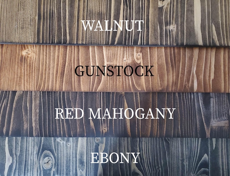 May include: Four wood samples stained in different colors: walnut, gunstock, red mahogany, and ebony.
