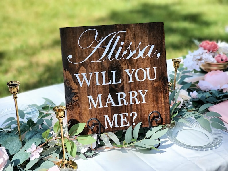 Proposal signs made from wood for special events. Pop the question wood sign