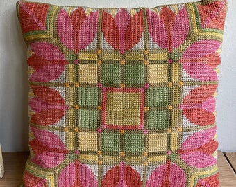 Vintage cross stitched cushion