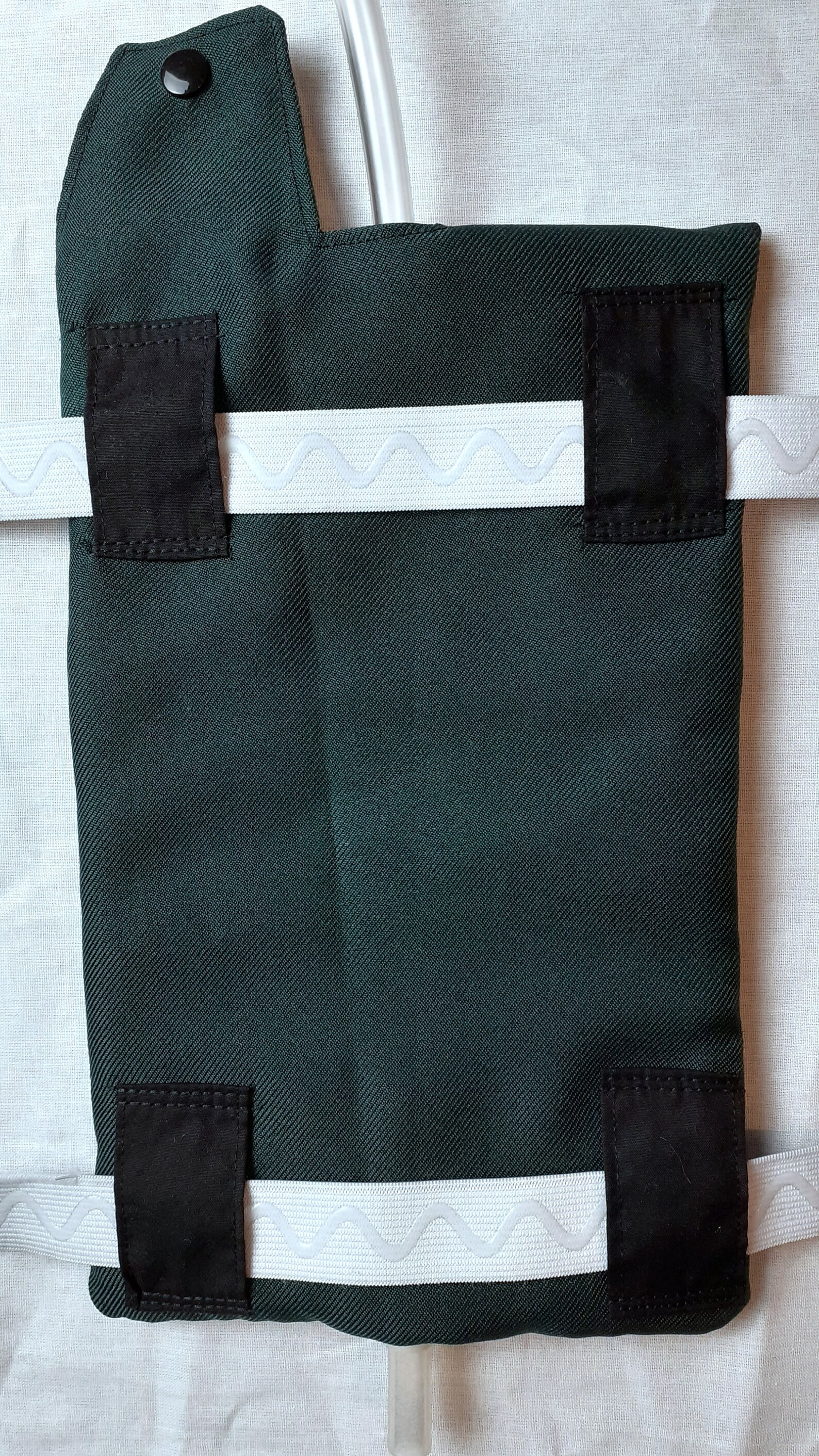 Catheter leg bag cover with a pocket. Suiting fabric is Etsy