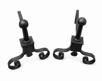 Pair of 19th-century iron fireplace andirons in elegant castle style