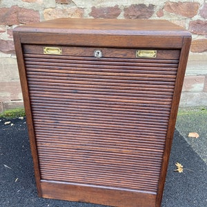 File cabinet with sliding curtain File cabinet rolladenschrank tambour cabinet France 1950 image 1