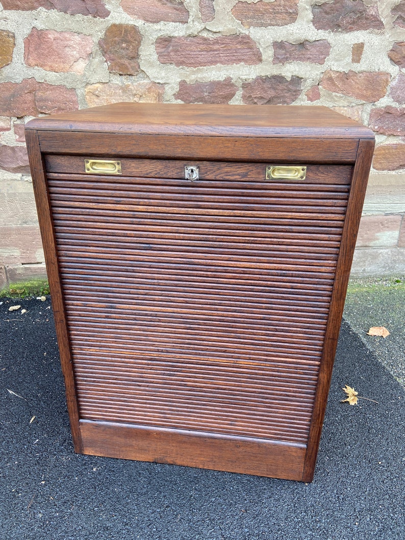 File cabinet with sliding curtain File cabinet rolladenschrank tambour cabinet France 1950 image 1