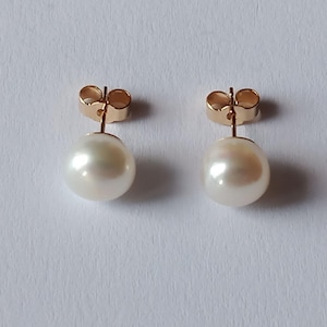Parels 8 mm oorbellen 375 goud zoetwaterparels