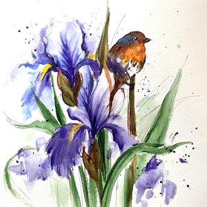 May include: Watercolor painting of purple iris flowers with green leaves and a small bird perched on a stem. The bird has brown, orange, and blue feathers. Black paint splatters add detail to the floral artwork.