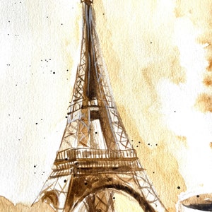 K&ouml;nnte beinhalten: Ein Aquarellbild des Eiffelturms in Paris, Frankreich. Das Bild ist in Braun- und Wei&szlig;t&ouml;nen gehalten, mit einem Kaffeefleck-Effekt. Im unteren rechten Eck des Bildes ist eine Tasse Kaffee zu sehen.