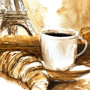 K&ouml;nnte beinhalten: Ein Aquarellbild einer Tasse Kaffee mit aufsteigendem Dampf, einem Croissant und dem Eiffelturm im Hintergrund. Das Bild ist auf braunem Untergrund mit Kaffeeflecken gemalt.