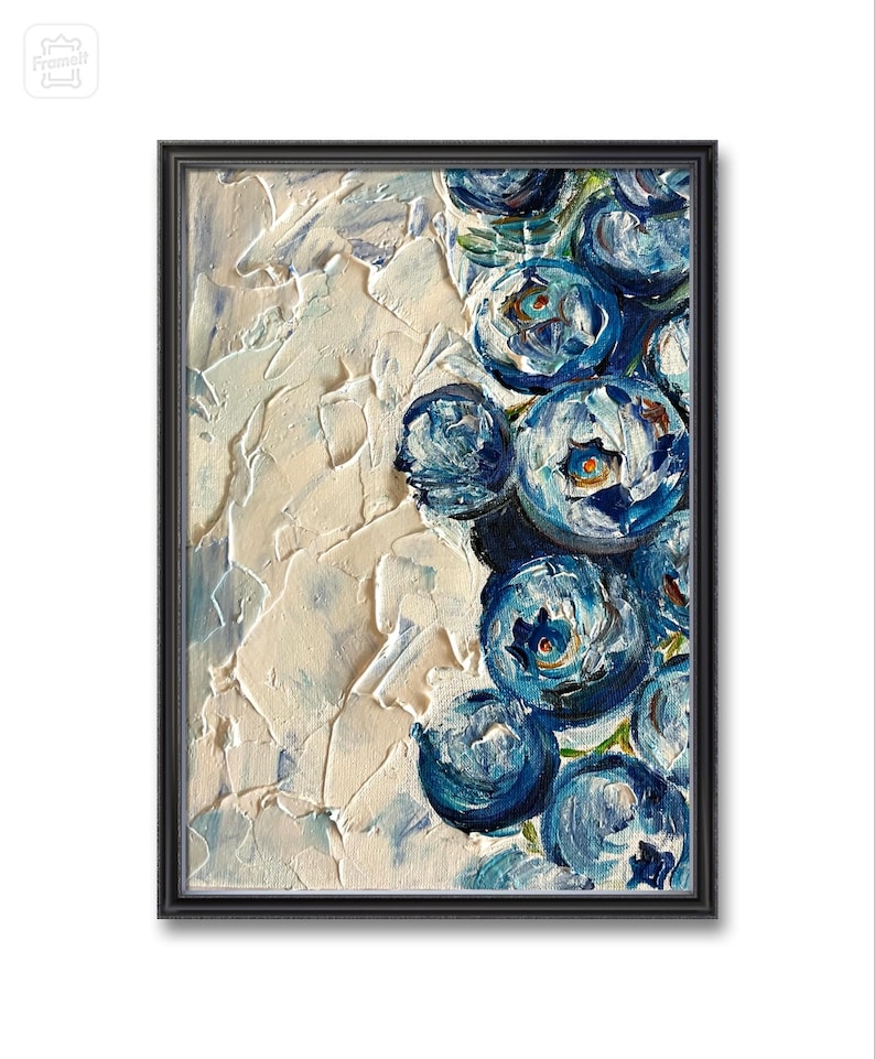 May include: An oil painting of blueberries in a black frame. The painting features a textured, off-white background with a cluster of blue blueberries on the right side. The blueberries have a textured appearance with hints of green.