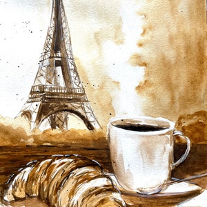 K&ouml;nnte beinhalten: Aquarellmalerei eines Croissants, einer Tasse Kaffee und des Eiffelturms. Das Gem&auml;lde ist in Braun- und Wei&szlig;t&ouml;nen gehalten.