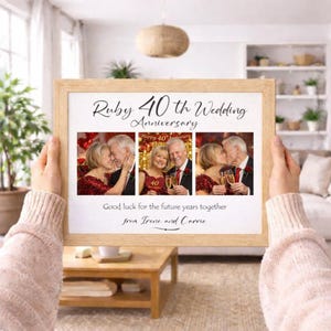 May include: A framed print commemorating a Ruby 40th Wedding Anniversary. The print displays three photographs of a couple, with the text "Ruby 40th Wedding Anniversary" and "Good luck for the future years together from Irene and Carrie."