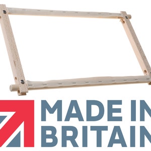 May include: A wooden embroidery hoop with white fabric stretched across it. The hoop is made in Britain.