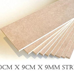 May include: A stack of 9 mm thick wood strips, each measuring 120 cm long and 9 cm wide. The strips are light brown and have a smooth surface.