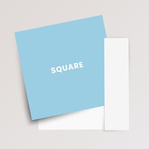 May include: A light blue square card with the word SQUARE printed in white capital letters, positioned partially overlapping a plain white rectangular card and a separate vertical white strip on a neutral light gray background.