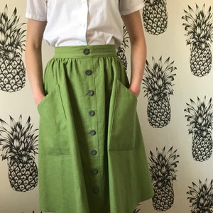 100% Linen skirt with pockets and optional buttons, size-friendly, customizable and made to order in Sussex, UK