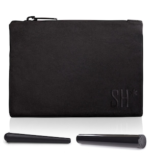 May include: A black rectangular zippered pouch with a textured fabric surface and the letters SH followed by an asterisk embossed in the bottom right corner. Below the pouch are two black cylindrical objects, one matte and one glossy with a cap.