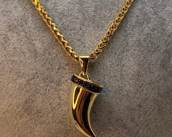 Lion teeth hot sale locket in gold