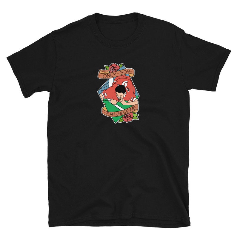 May include: Black t-shirt with a graphic of a football player in a red jersey with the text "Only God Can Judge Me" in a green banner with red roses.
