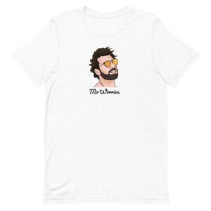 May include: White t-shirt featuring a cartoon illustration of a man wearing sunglasses and the text "Mo Worries".