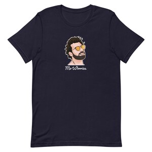 May include: A navy blue t-shirt featuring a cartoon illustration of a man wearing sunglasses and the text "Mo Worries".