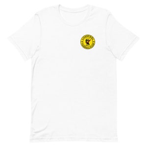 May include: White t-shirt with a yellow circle logo featuring a red bird and the text "Liverpool Football Club 1892"