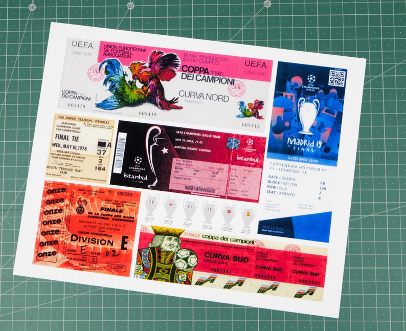 May include: A collection of vintage soccer ticket stubs and memorabilia featuring the UEFA Champions League Final, Coppa dei Campioni, and other soccer events. The tickets are printed on paper and feature various designs, including a rooster, a trophy, and a soccer player. The tickets are in various colors, including red, blue, white, and black.
