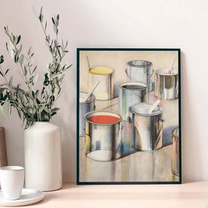 Puede incluir: Una impresión enmarcada de un bodegón que representa ocho botes de pintura de varios colores, incluyendo rojo, amarillo, negro y blanco. Los botes están dispuestos en un patrón escalonado sobre una superficie gris claro. La pintura está realizada en un estilo realista con pinceladas detalladas.