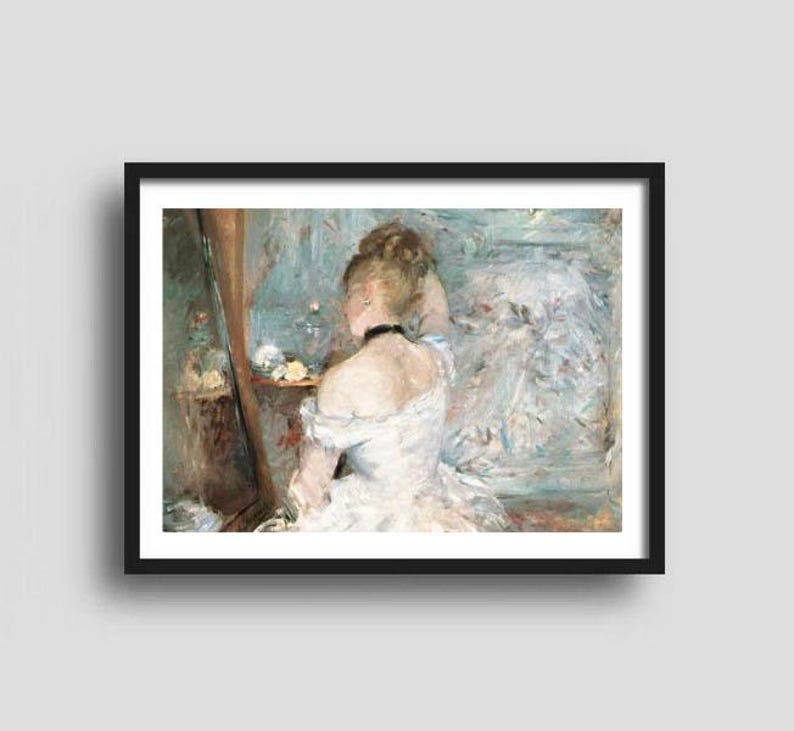 May include: Framed art print of a woman in a white dress, facing a mirror. The painting features soft brushstrokes and a muted color palette of blues, whites, and browns. The woman is wearing a black choker.