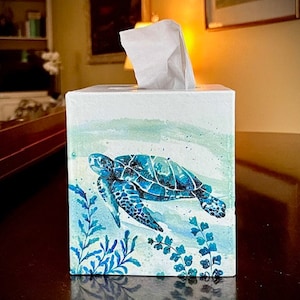 Omslag till näsduksask för havssköldpaddor: Dekoration av kuststrandhus