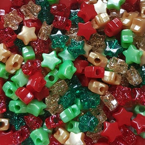50 Christmas Stars Pony Beads Mix 6mmx9mm Red Green Gold Glitter Hair Dummy Clip Jewellery Loom Bands Crafts