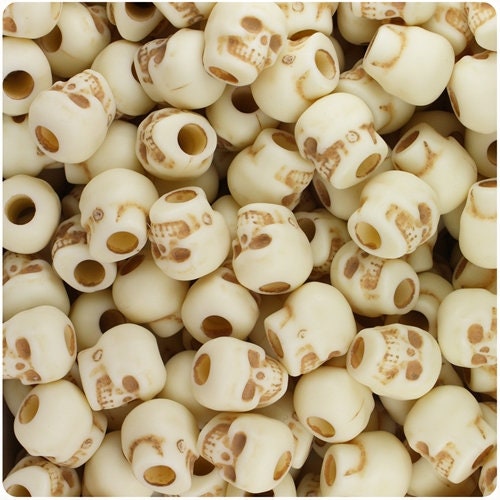 1180SV073A – 11 x 9mm Skull Beads – Antiqued White – 1/4 Lb Value
