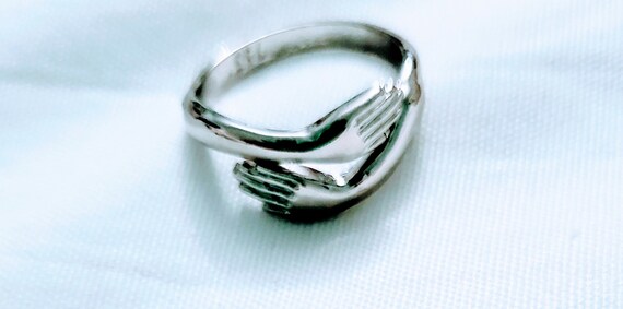 Adjustable Silvertone Hugging Hands Ring - image 3