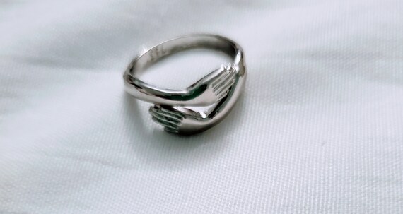Adjustable Silvertone Hugging Hands Ring - image 4