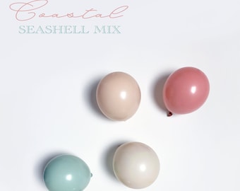 Kit de arco de guirnalda de globos con conchas costeras en tonos pastel. Tonos suaves y apagados: malva, rosa, rubor, crema y menta. Primer cumpleaños de niña, revelación de género en neutro.