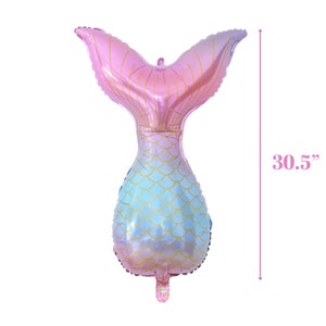 May include: A pink and blue iridescent mermaid tail shaped foil balloon. The balloon is 30.5 inches tall.