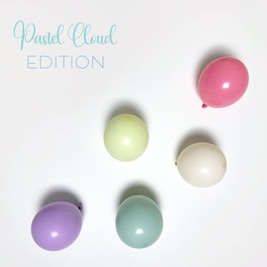 May include: Five pastel coloured balloons on a white background. The balloons are light green, light blue, purple, white and pink. The text "Pastel Cloud EDITION" is at the top of the image.