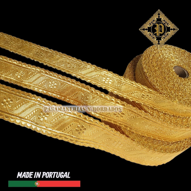 May include: Gold-colored decorative trim with intricate floral and geometric patterns. A roll of the trim is visible, along with several lengths of the trim unrolled. The text "PASAMANERIAS Y BORDADOS" and "MADE IN PORTUGAL" are also visible.